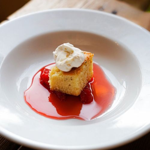 Toasted pepper genoise with vanilla chantilly cream and macerated strawberries